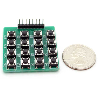 a micro board with a coin next to it